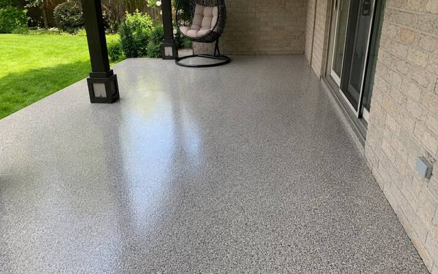 Flake epoxy floor on a covered porch in Cambridge, Ontario